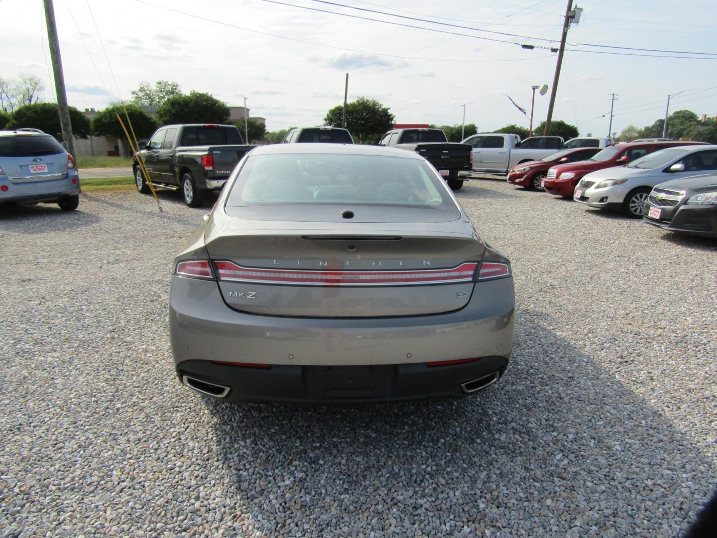 2015 Silver /Tan Lincoln MKZ FWD (3LN6L2GK9FR) with an 3.7L V6 DOHC 24V engine, Automatic transmission, located at 15016 S Hwy 231, Midland City, AL, 36350, (334) 983-3001, 31.306210, -85.495277 - Photo#6